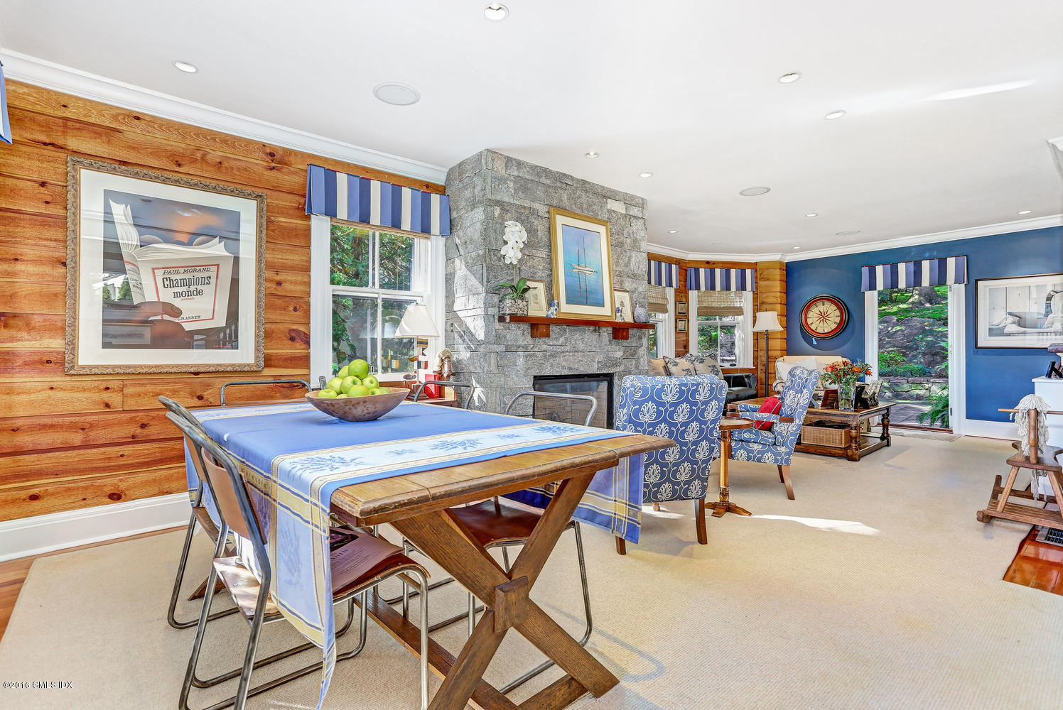 36 Arch Street Riverside, CT 06878 - Photo 8 of 37 a dining room with furniture and a floor to ceiling window or couch