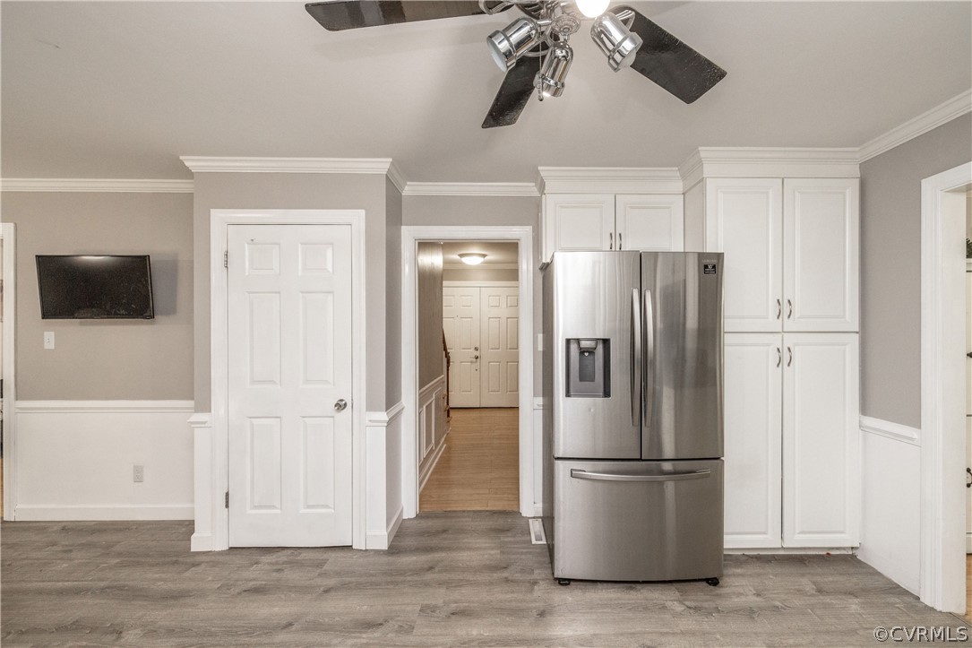 13907 Barnes Spring Road Midlothian, VA 23112 - Photo 11 of 43 a metallic refrigerator freezer sitting in a kitchen