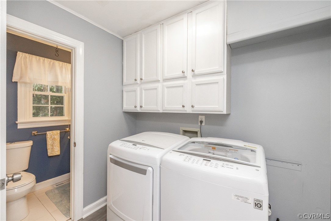 13907 Barnes Spring Road Midlothian, VA 23112 - Photo 16 of 43 a utility room with dryer and washer