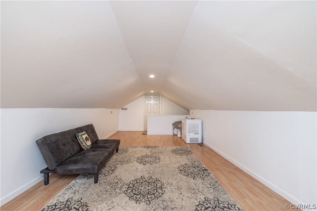 13907 Barnes Spring Road Midlothian, VA 23112 - Photo 22 of 43 a living room with a couch and a rug