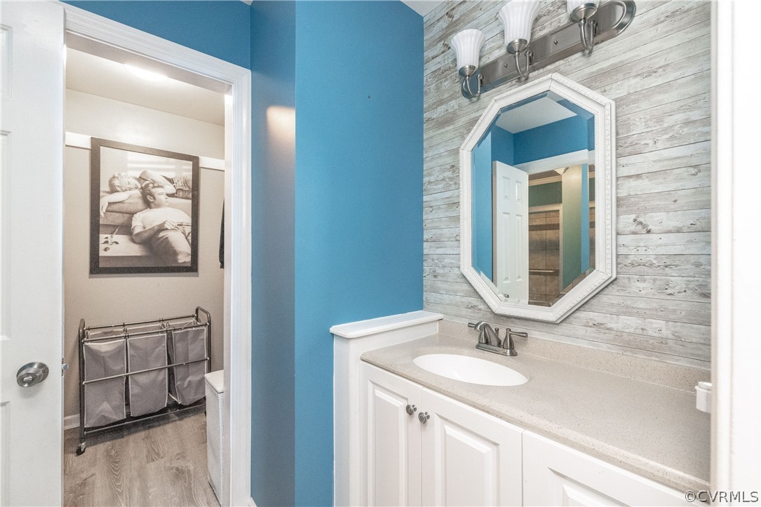 13907 Barnes Spring Road Midlothian, VA 23112 - Photo 23 of 43 a bathroom with a sink and a mirror
