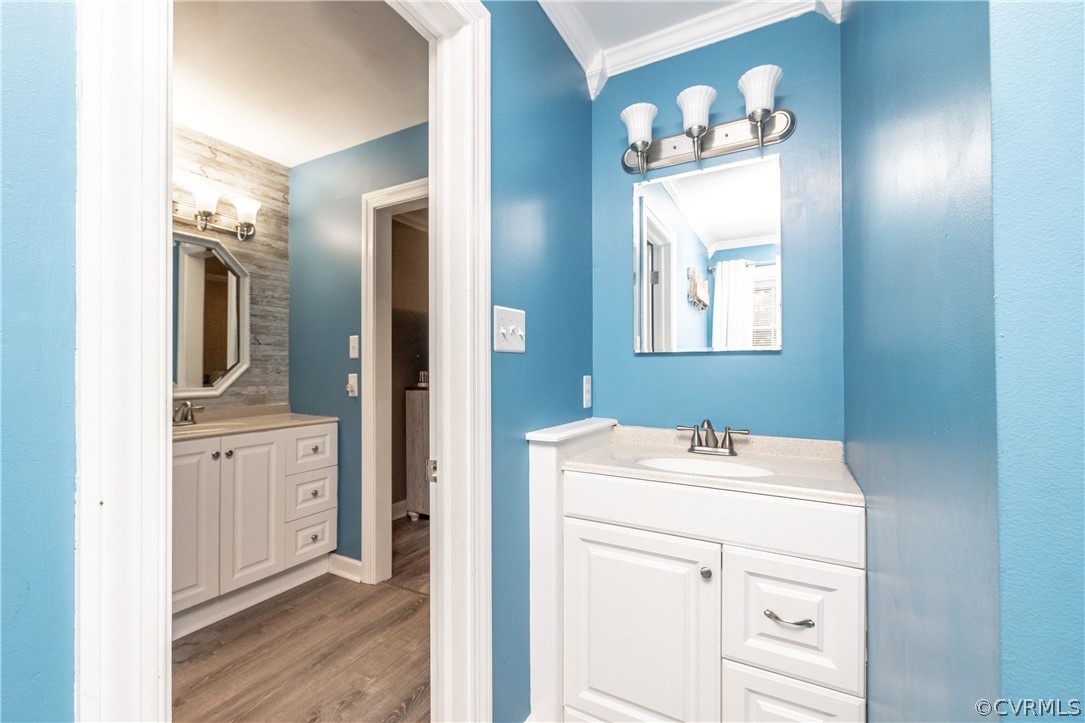 13907 Barnes Spring Road Midlothian, VA 23112 - Photo 25 of 43 a bathroom with a sink vanity and mirror