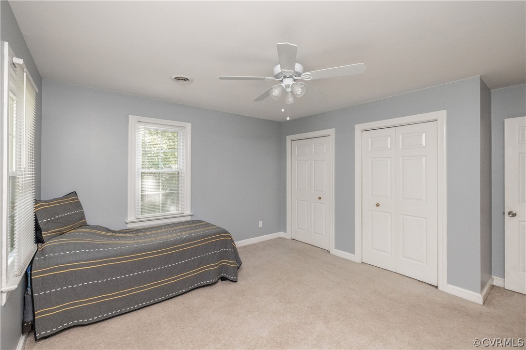 13907 Barnes Spring Road Midlothian, VA 23112 - Photo 30 of 43 a bedroom with a bed and a window