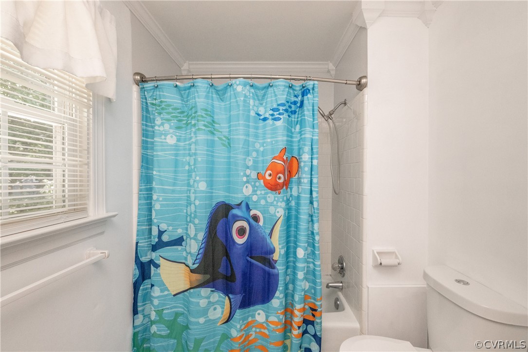 13907 Barnes Spring Road Midlothian, VA 23112 - Photo 32 of 43 a bathroom with a toilet and a shower curtain