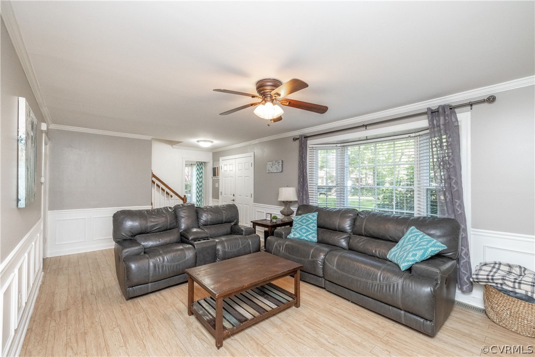 13907 Barnes Spring Road Midlothian, VA 23112 - Photo 6 of 43 a living room with furniture and a large window