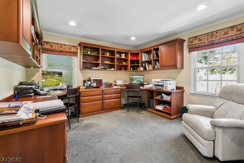 738 Springfield Avenue Summit, NJ 07901 - Photo 20 of 29 a living room with furniture and a large window