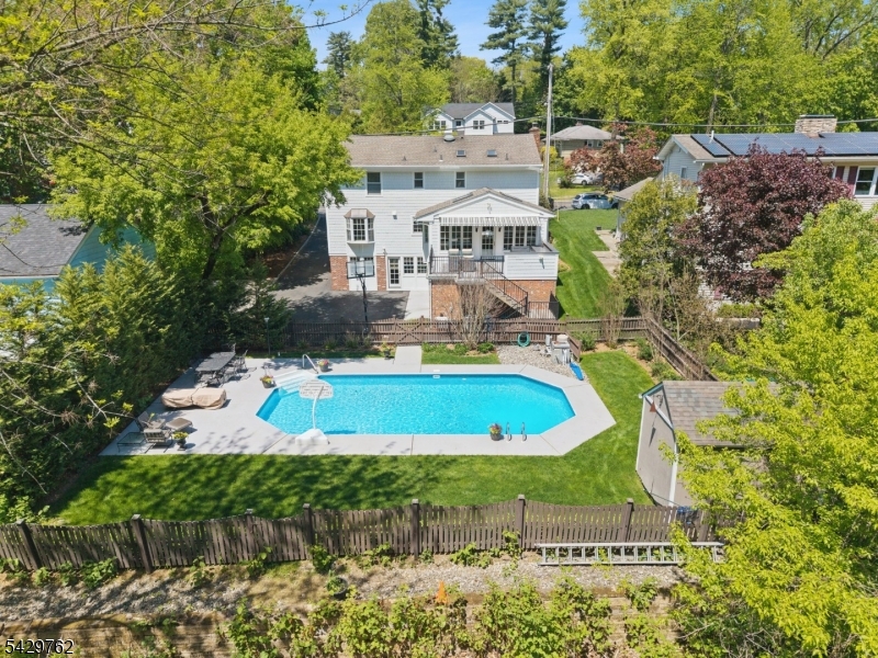 738 Springfield Avenue Summit, NJ 07901 - Photo 29 of 29 an aerial view of house with a swimming pool