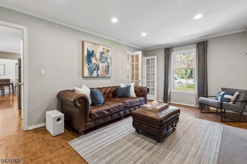738 Springfield Avenue Summit, NJ 07901 - Photo 6 of 29 a living room with furniture and a large window