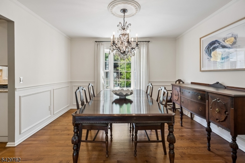 738 Springfield Avenue Summit, NJ 07901 - Photo 7 of 29 a view of a dining room with furniture window and wooden floor
