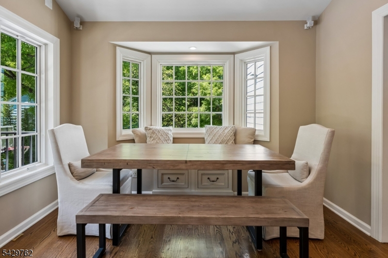 738 Springfield Avenue Summit, NJ 07901 - Photo 8 of 29 a view of a dining room with furniture window and outside view