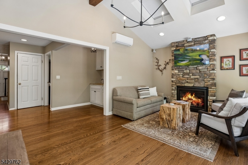 738 Springfield Avenue Summit, NJ 07901 - Photo 10 of 29 a living room with furniture and a fireplace