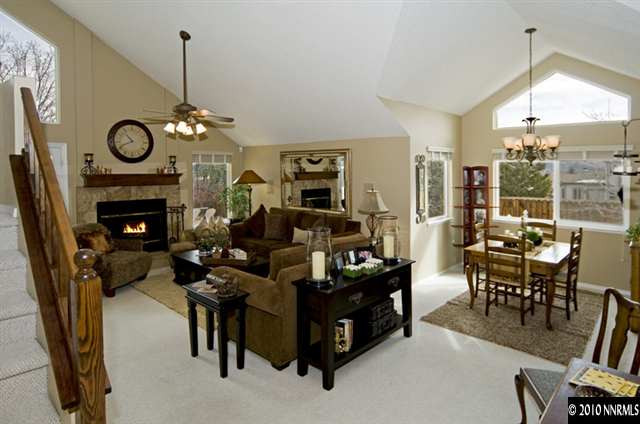 2205 Snowmass Drive Reno, NV 89511 - Photo 2 of 9 a living room with furniture kitchen view and a chandelier
