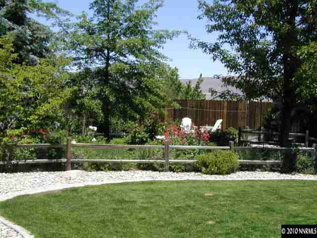 2205 Snowmass Drive Reno, NV 89511 - Photo 9 of 9 a view of a table and chairs in the garden