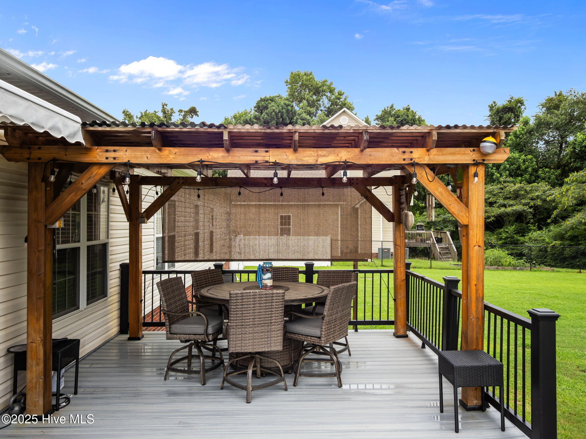 216 Raven Ridge Court Swansboro, NC 28584 - Photo 41 of 55 Trex deck/ pergola and awning