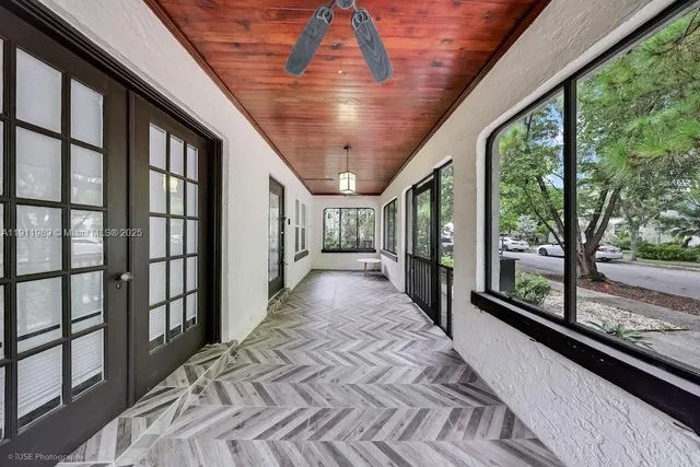 a view of a porch with wooden floor and outdoor space
