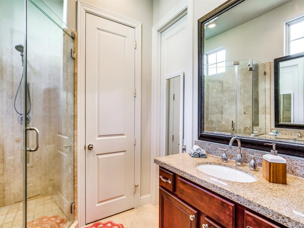 1246 Sampson Street Houston, TX 77003 - Photo 14 of 18 The primary bath has a stand-up shower with tons of space!