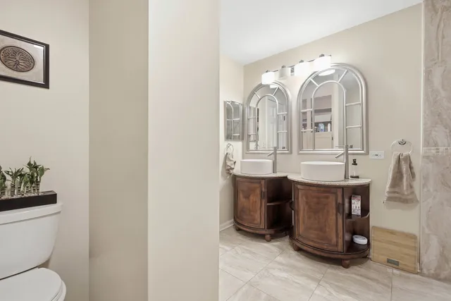 a view of living room filled with furniture and window