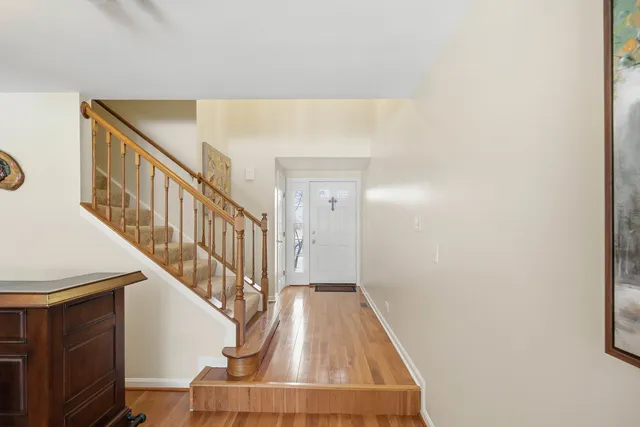 a view of entryway with wooden floor