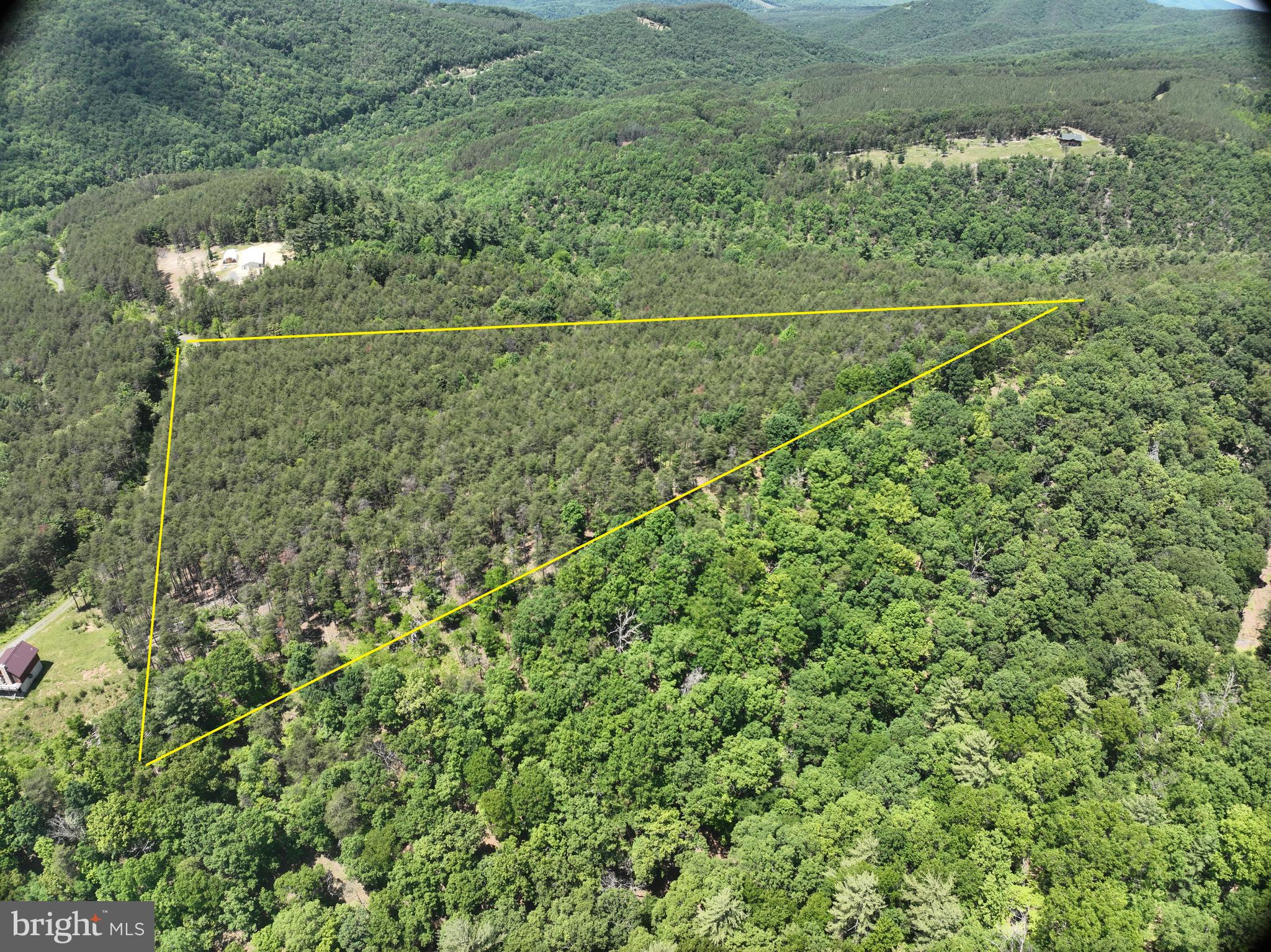 61 Ruckman Road Moorefield, WV 26836 - Photo 1 of 13 a view of a field of grass and trees