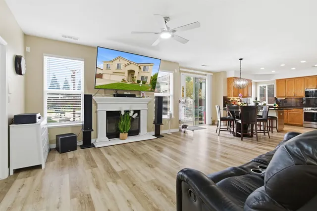 a view of a livingroom with furniture and a window