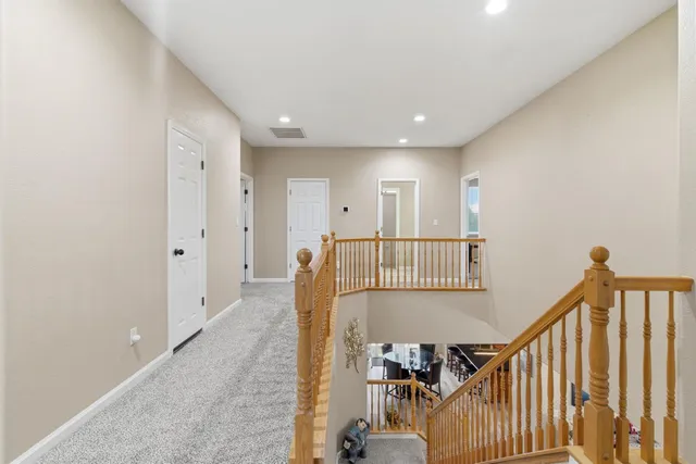 a bathroom with a sink double vanity and a mirror