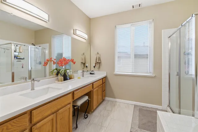 a aerial view of a house with a yard