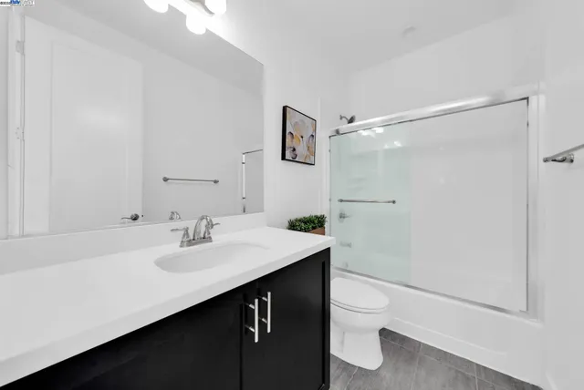 a front view of a house with a garage