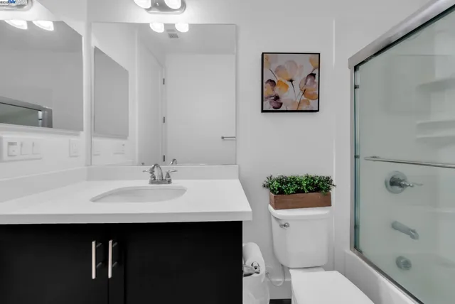 a view of a building with sitting area