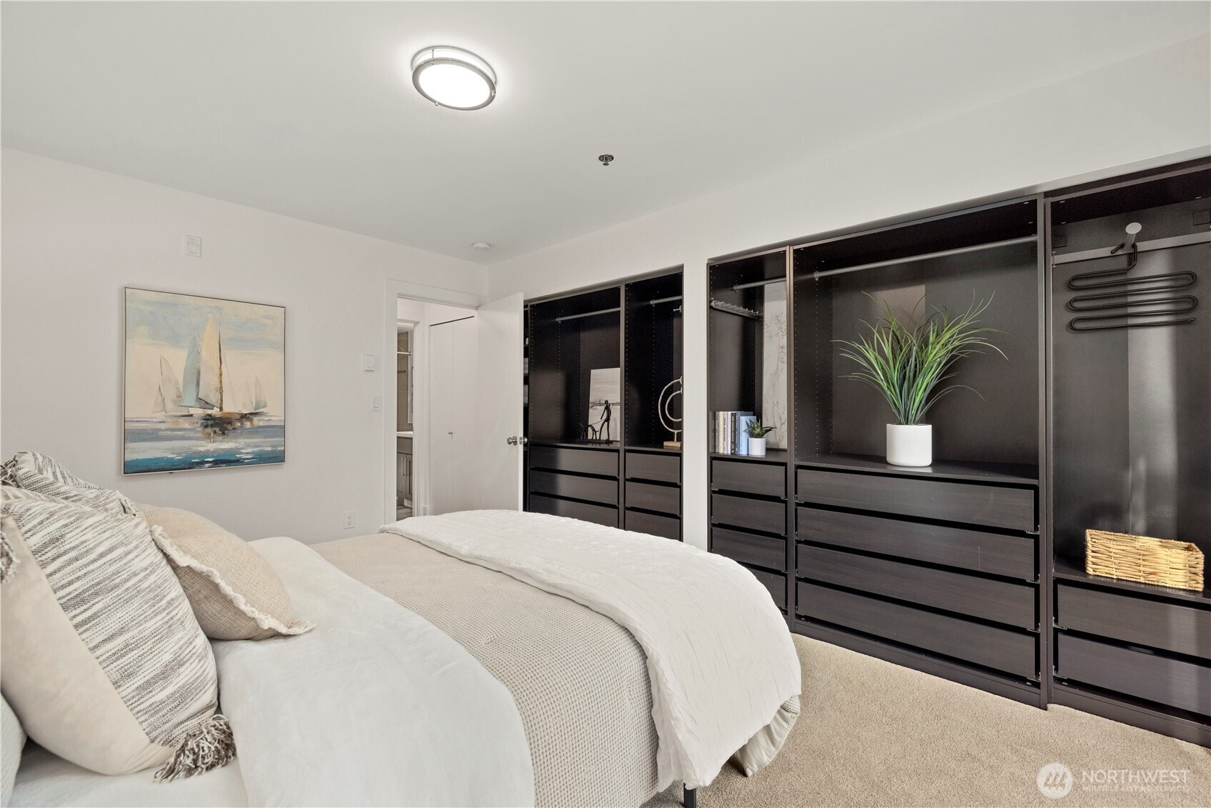 500 5th Avenue West, Unit 306 Seattle, WA 98119 - Photo 13 of 21 a bedroom with a bed and a large window