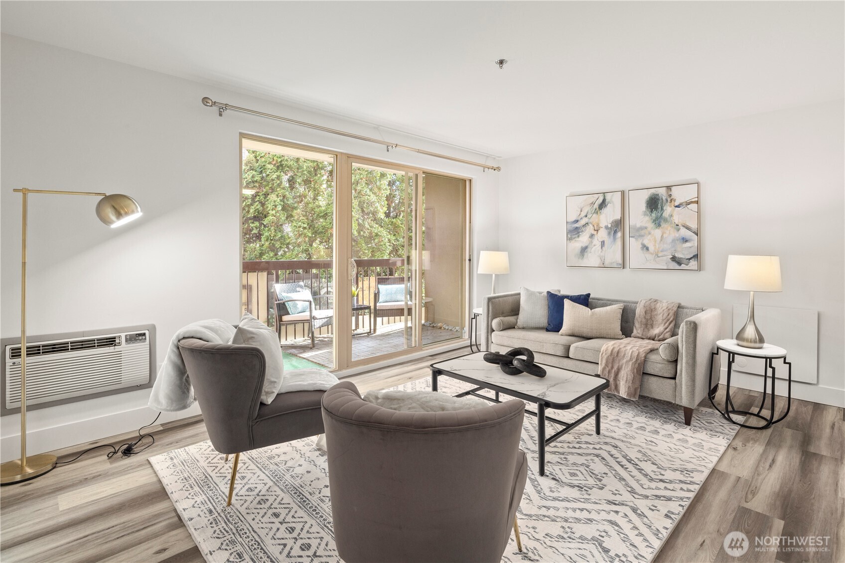 500 5th Avenue West, Unit 306 Seattle, WA 98119 - Photo 10 of 21 a living room with furniture and a window