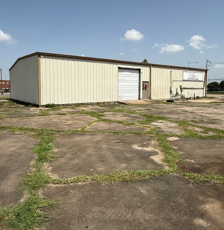 3750 Red Bluff Road Pasadena, TX 77503 - Photo 2 of 7 a view of an empty room with wooden floor and a window