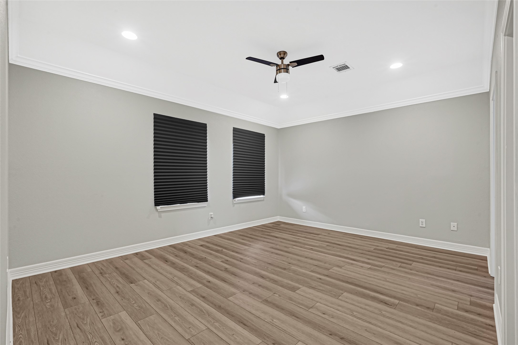 9823 Bamboo Road, Unit B Houston, TX 77041 - Photo 27 of 33 This bedroom features a ceiling fan and natural light