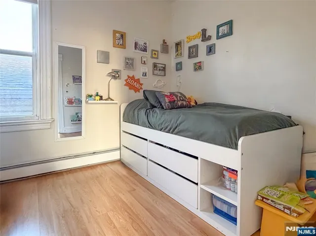 a room with toys and a large window