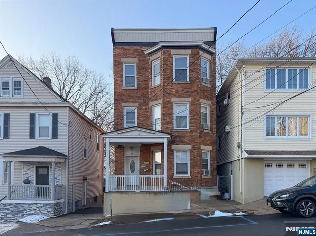 a picture of a wall with a table and a painting