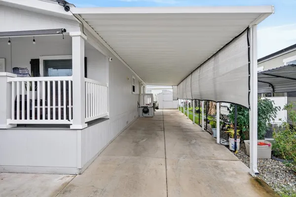 a view of a porch with furniture