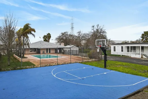 a view of a house with swimming pool