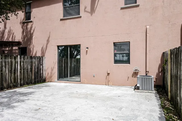 a view of a backyard of a house
