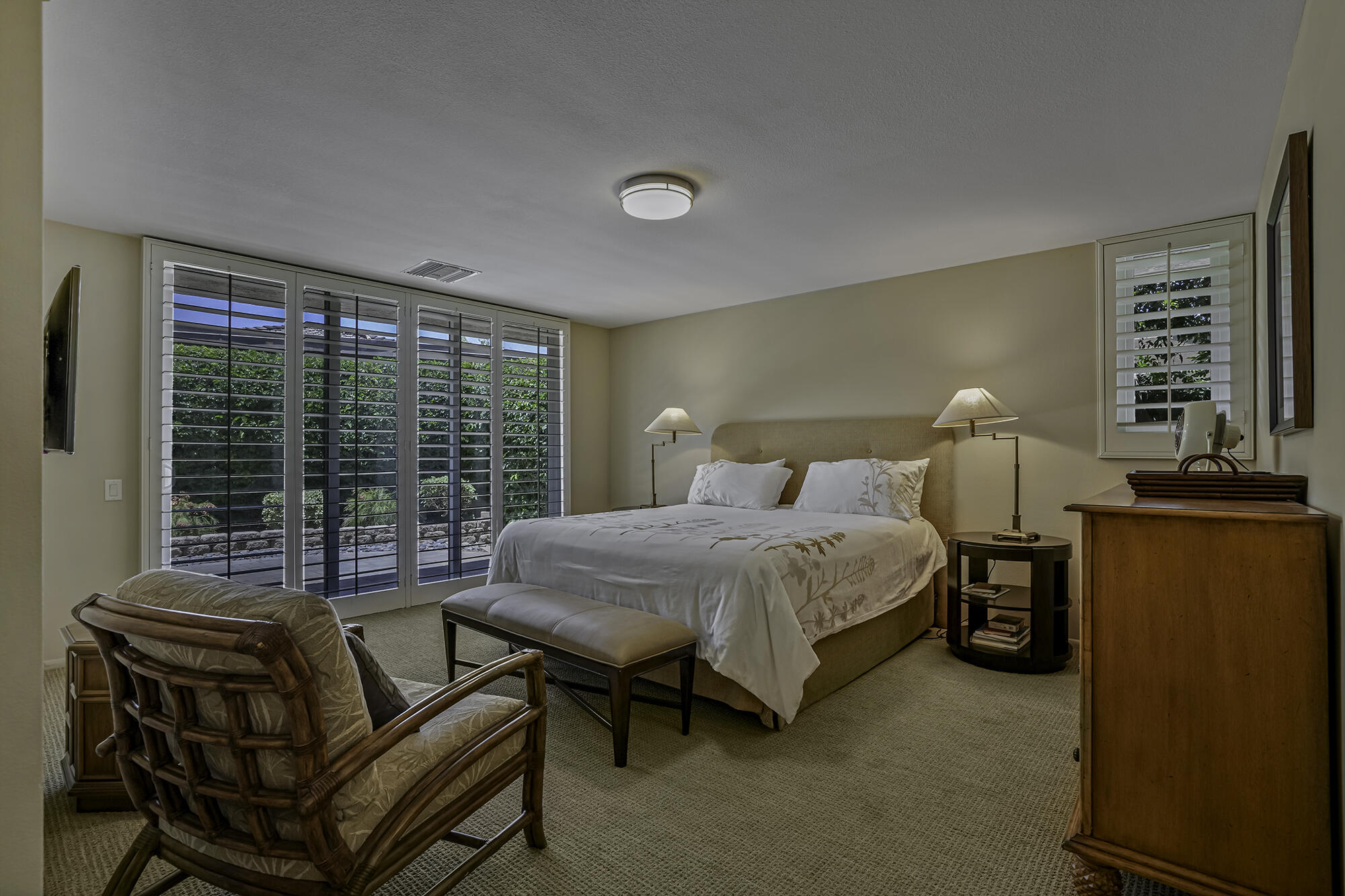 4 Stephens Court Rancho Mirage, CA 92270 - Photo 12 of 50 a bedroom with furniture and a window