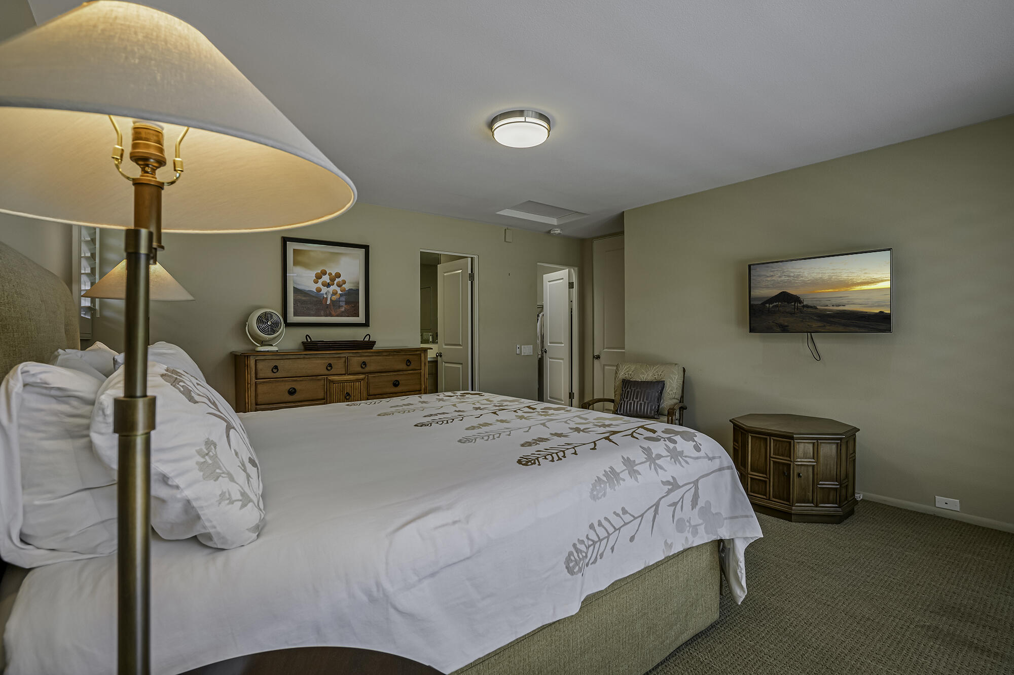 4 Stephens Court Rancho Mirage, CA 92270 - Photo 13 of 50 a bedroom with a bed and a flat screen tv