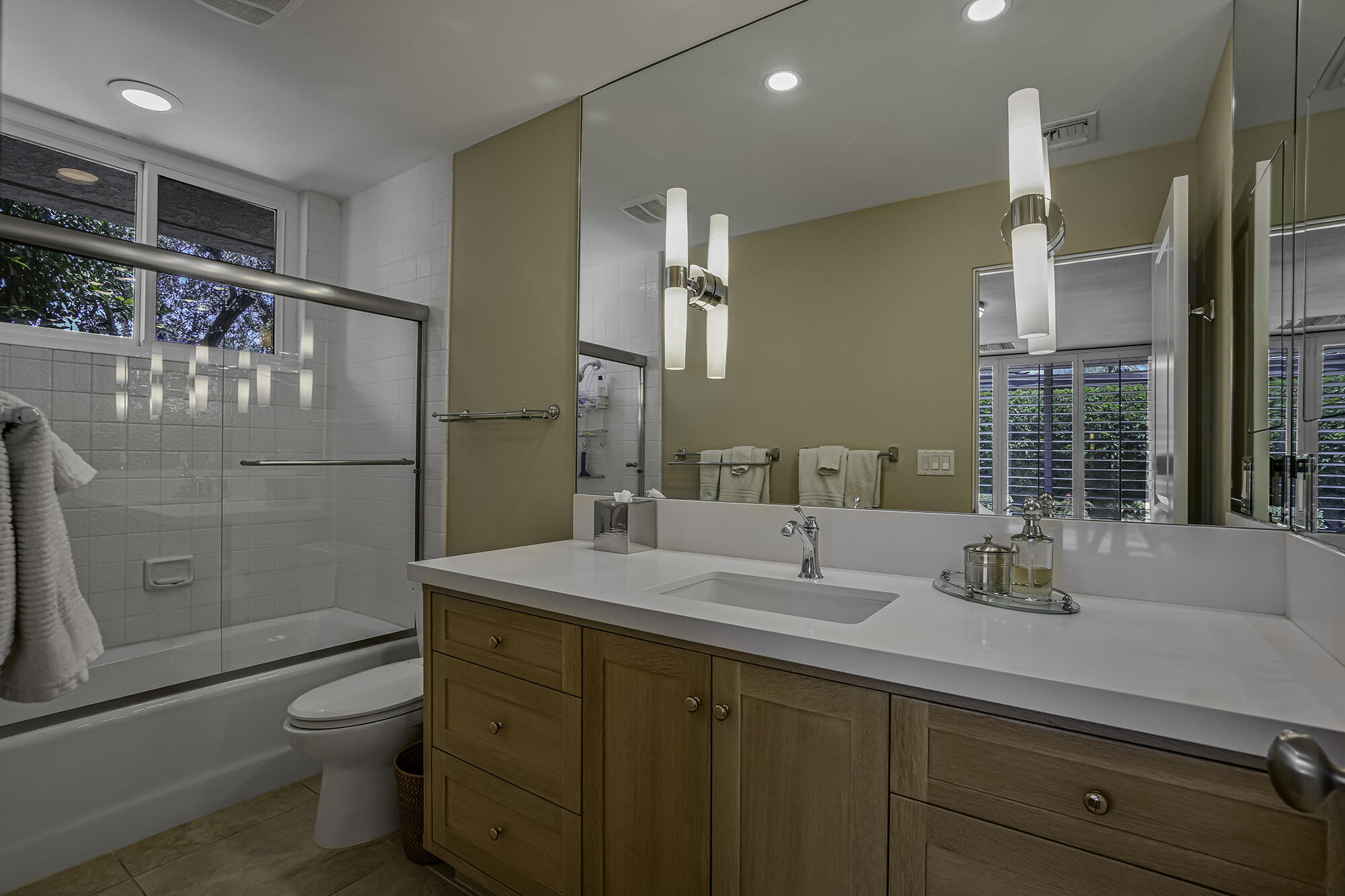 4 Stephens Court Rancho Mirage, CA 92270 - Photo 15 of 50 a bathroom with a double vanity sink toilet mirror and shower