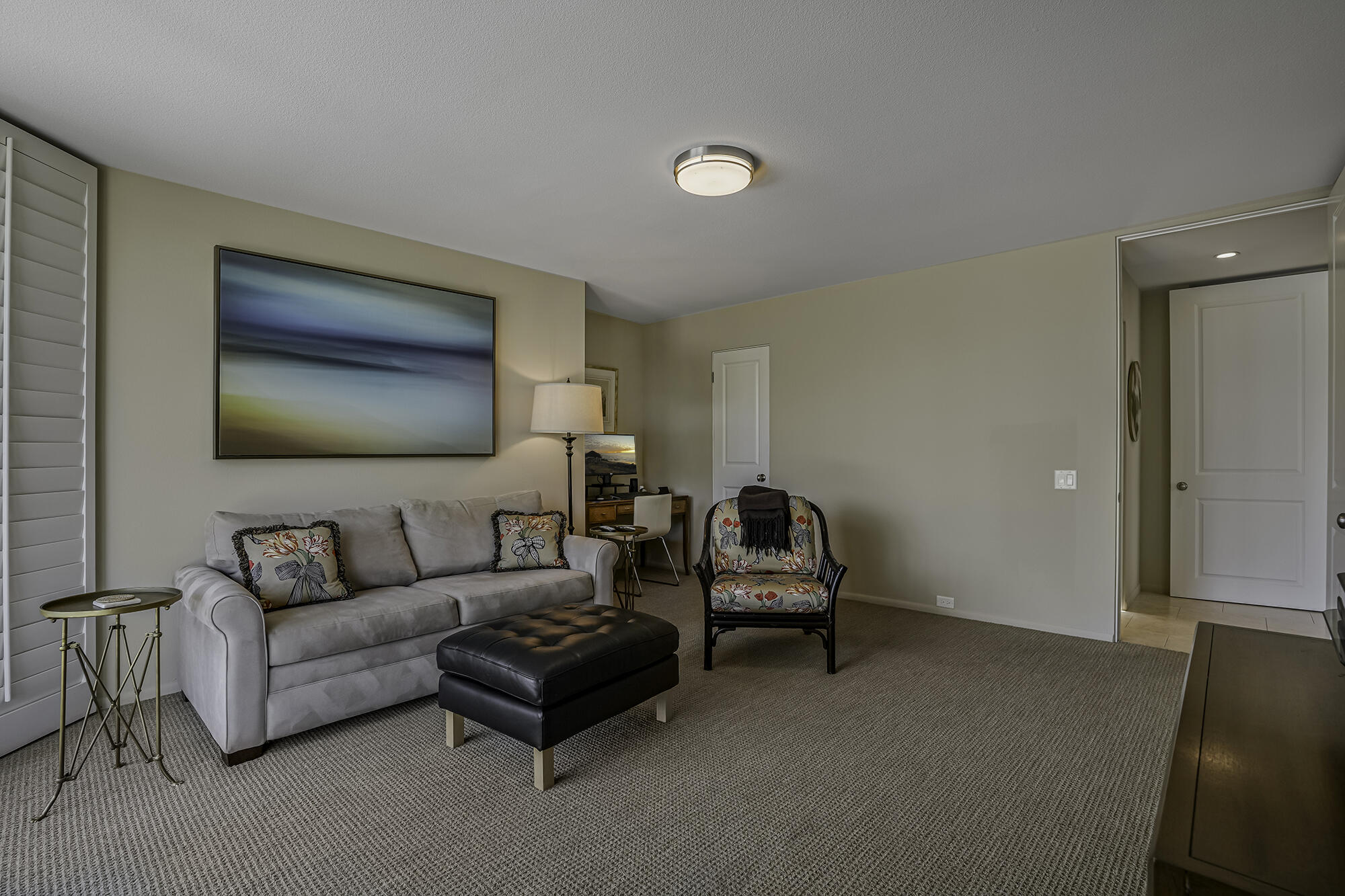 4 Stephens Court Rancho Mirage, CA 92270 - Photo 21 of 50 a living room with furniture and a flat screen tv