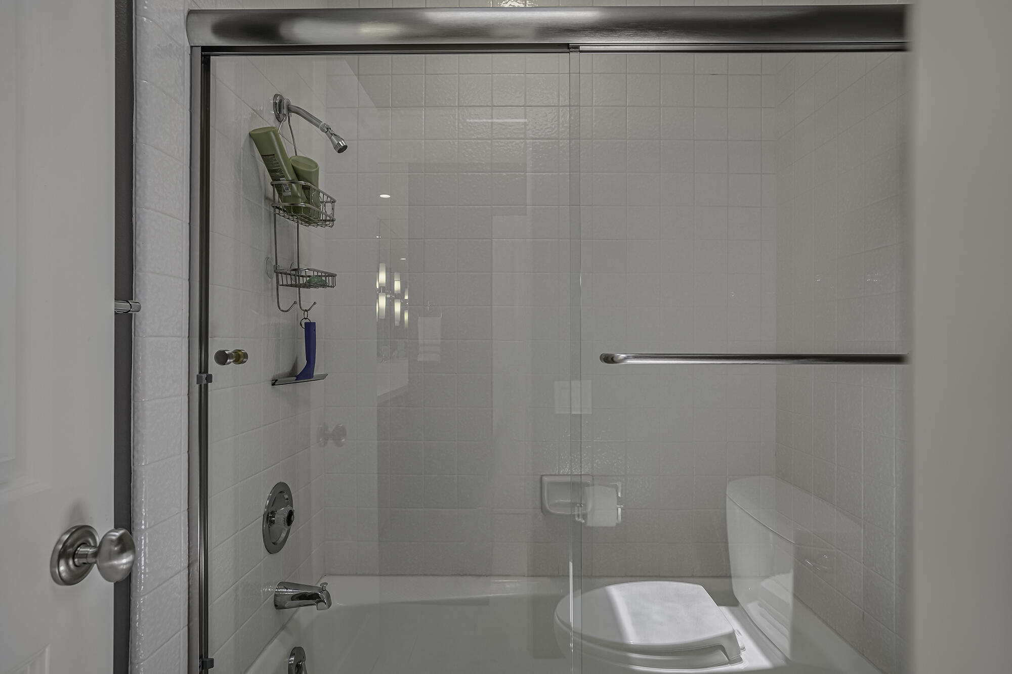 4 Stephens Court Rancho Mirage, CA 92270 - Photo 23 of 50 a white toilet sitting next to a bath tub and shower