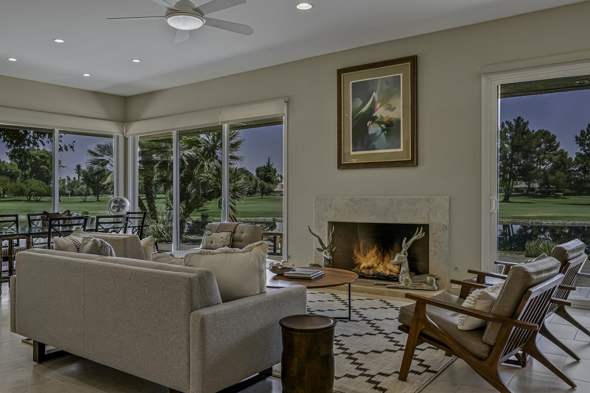 4 Stephens Court Rancho Mirage, CA 92270 - Photo 26 of 50 a living room with furniture and a fireplace