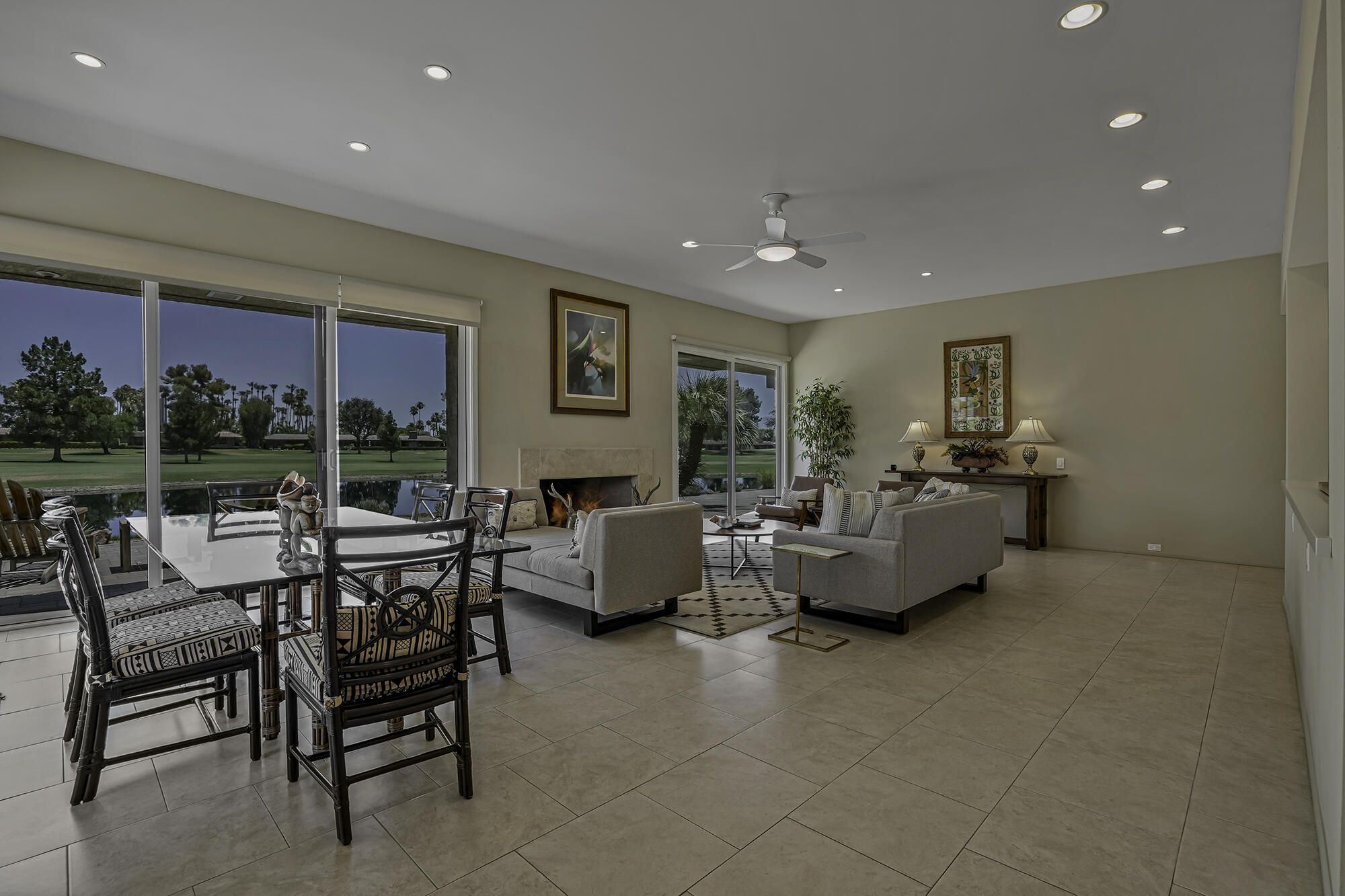 4 Stephens Court Rancho Mirage, CA 92270 - Photo 27 of 50 a living room with furniture and a large window