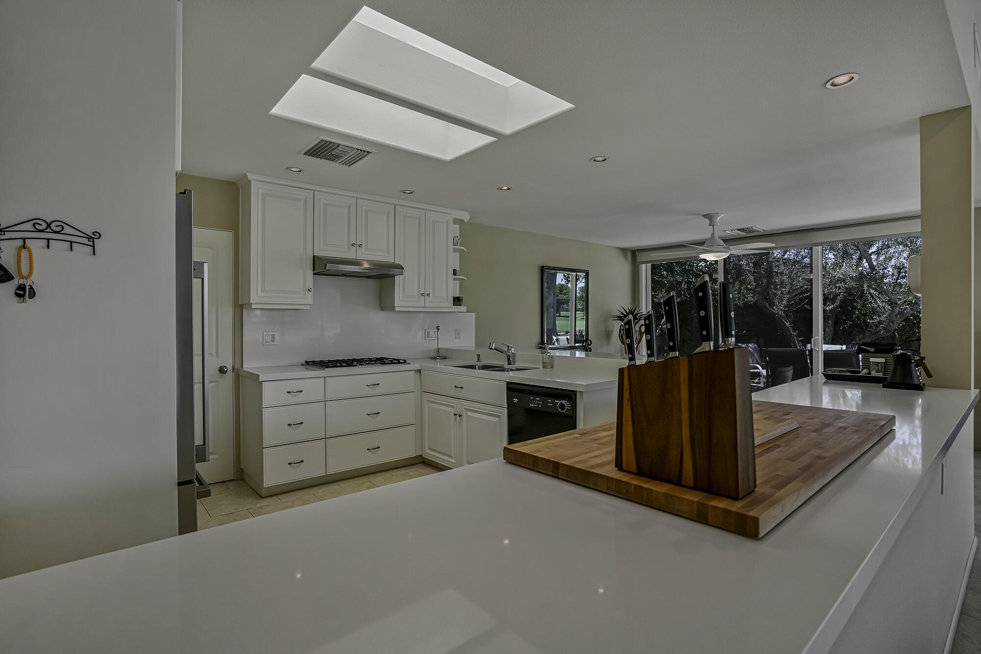 4 Stephens Court Rancho Mirage, CA 92270 - Photo 33 of 50 a kitchen with sink and cabinets