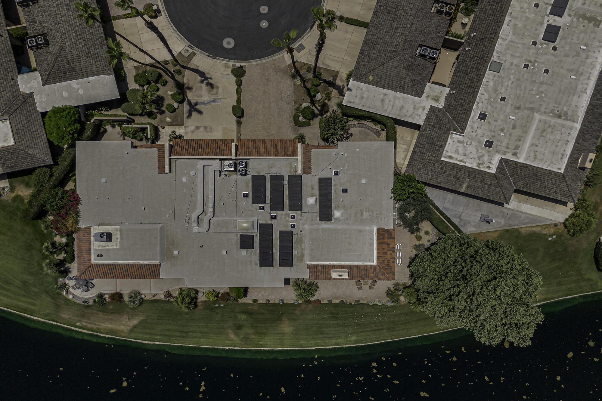 4 Stephens Court Rancho Mirage, CA 92270 - Photo 39 of 50 an aerial view of a residential apartment building with a yard