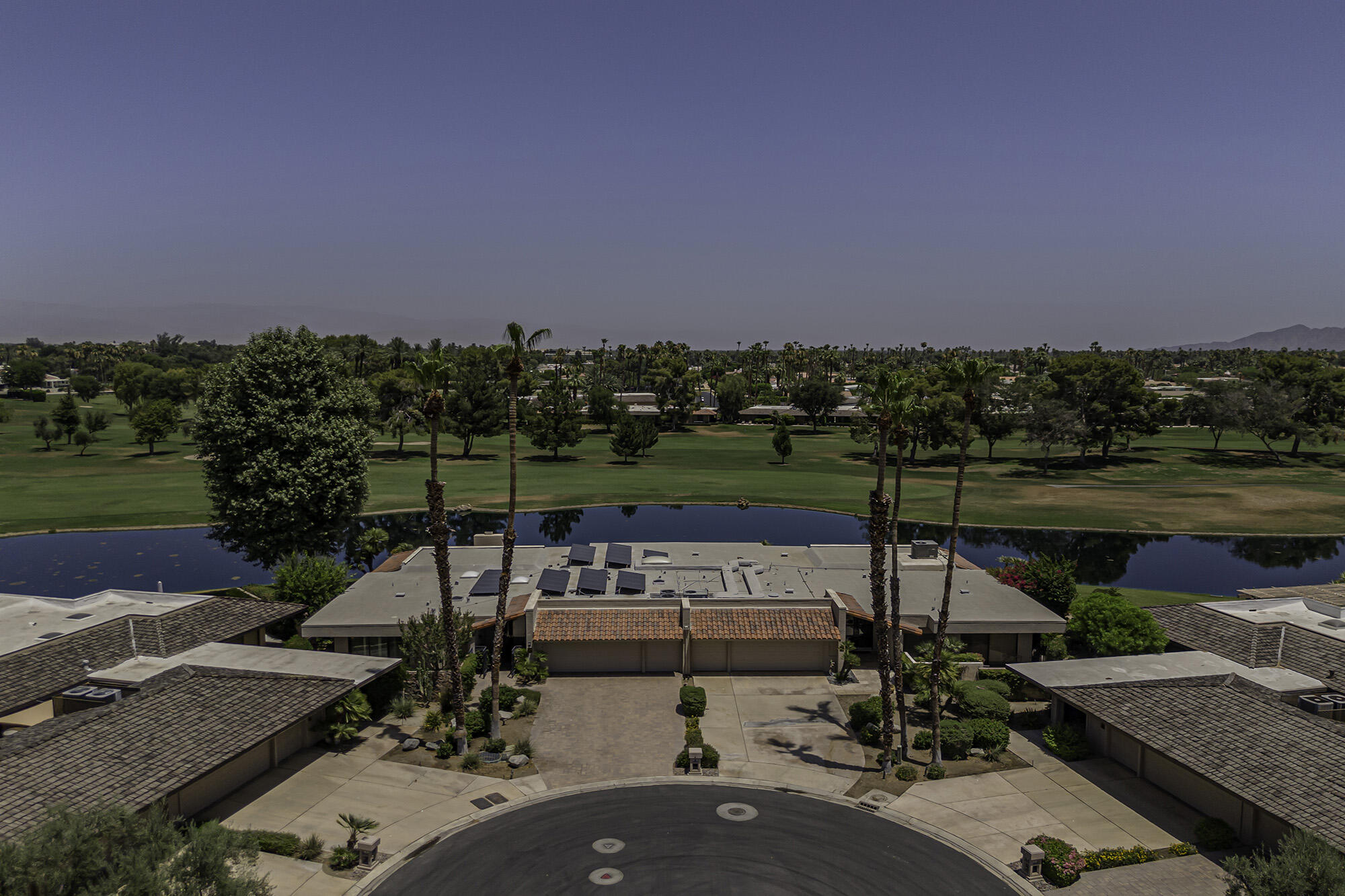 4 Stephens Court Rancho Mirage, CA 92270 - Photo 42 of 50 an outdoor space with furniture and garden