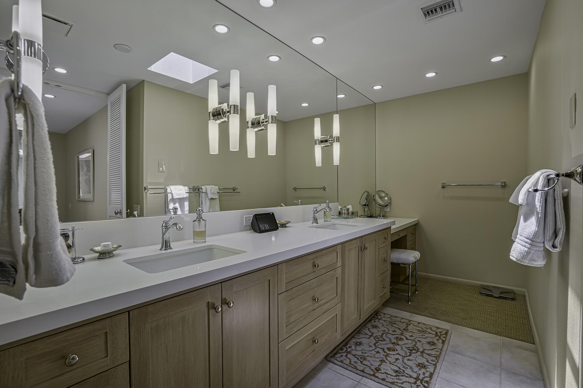 4 Stephens Court Rancho Mirage, CA 92270 - Photo 10 of 50 a bathroom with a double vanity sink mirror and toilet