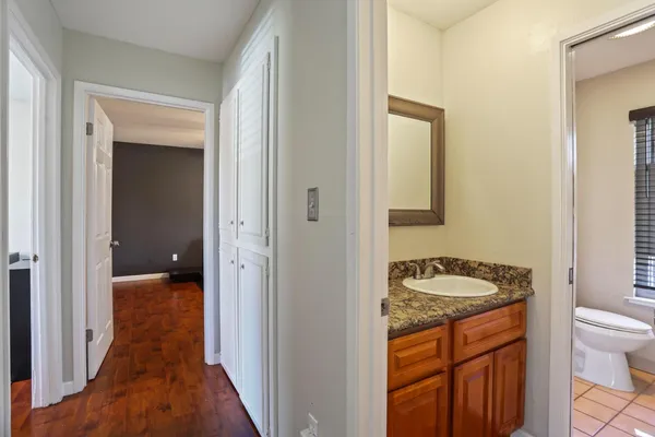 a view of storage and utility room with racks on the wall
