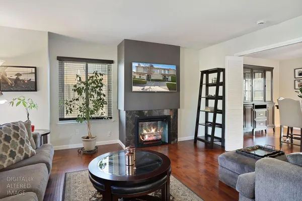 a kitchen with stainless steel appliances granite countertop a sink a stove and cabinets